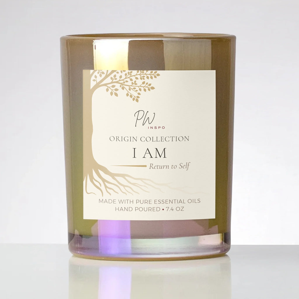 PW Inspo I AM coconut-soy candle in a mineral ash glass vessel with cream and gold label, part of The Origin Collection.